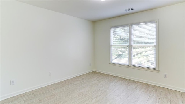127 Grandmar Chase, Canton, GA 30115 - empty room with light wood-style floors and baseboards
