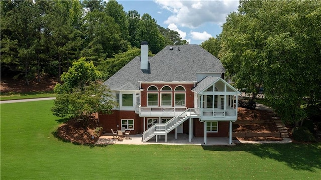 127 Grandmar Chase, Canton, GA 30115 - rear view of house featuring a patio, stairs, a chimney, a wooden deck, and a yard