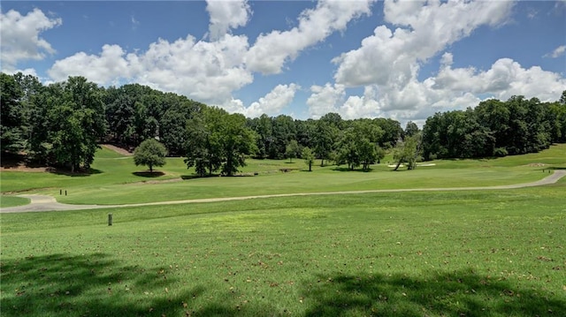 127 Grandmar Chase, Canton, GA 30115 - view of home's community featuring golf course view, view of wooded area, and a lawn
