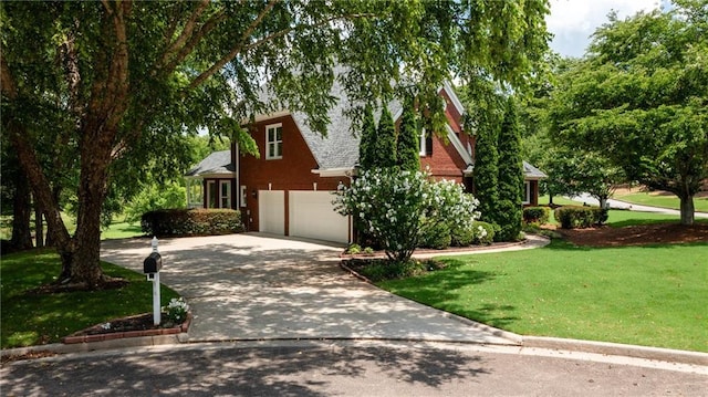 127 Grandmar Chase, Canton, GA 30115 - view of front of house with an attached garage, a front yard, and concrete driveway