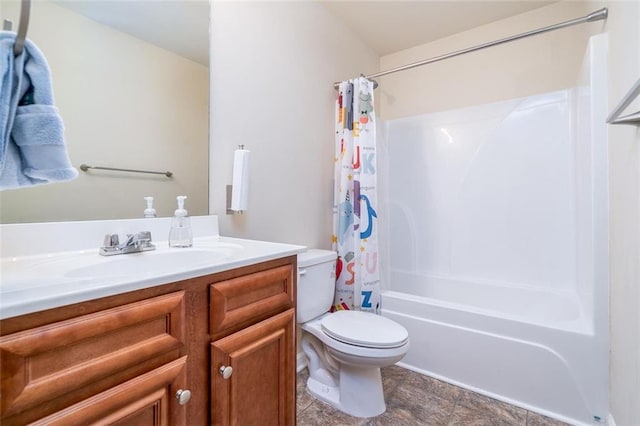 bathroom with toilet, vanity, and shower / tub combo