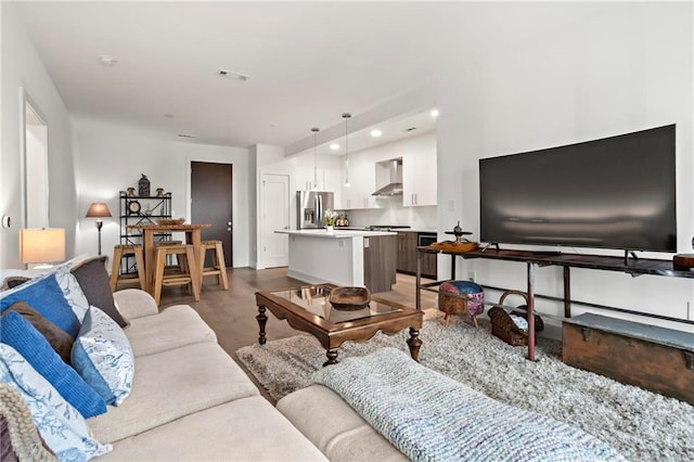 living room featuring dark hardwood / wood-style floors