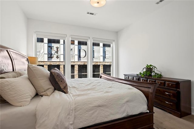 bedroom featuring hardwood / wood-style floors