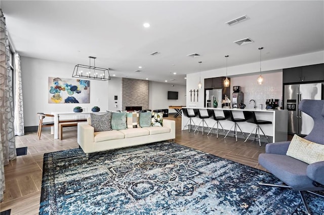 living room featuring parquet flooring