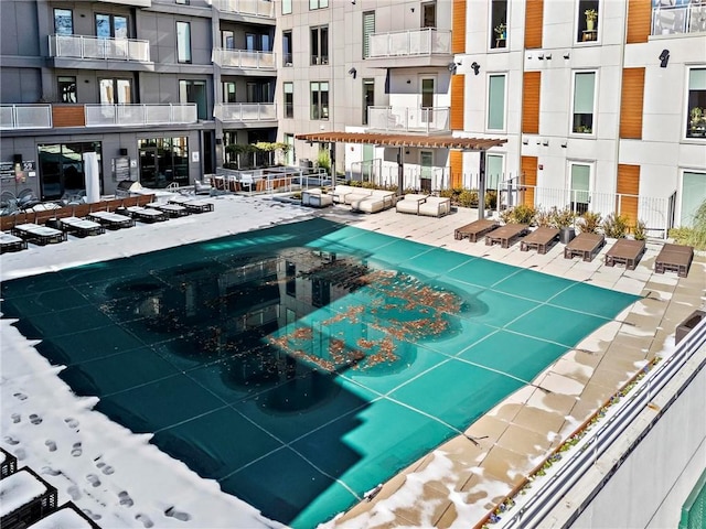 view of pool featuring a patio area