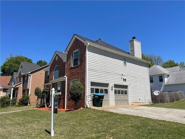 view of side of home featuring concrete driveway, a chimney, brick siding, a garage, and a lawn
