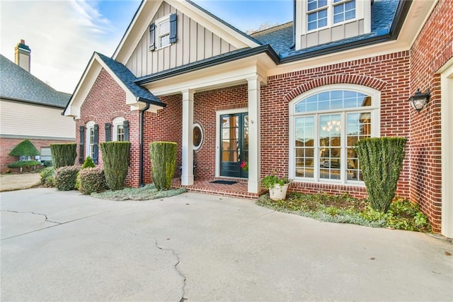 doorway to property featuring a patio area