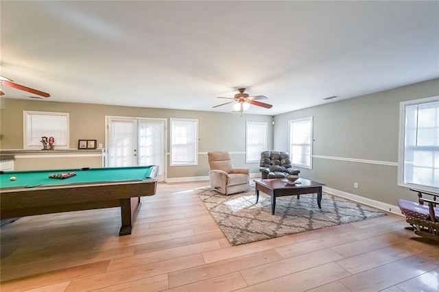 rec room featuring ceiling fan, light hardwood / wood-style flooring, plenty of natural light, and billiards