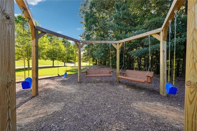 view of playground featuring a lawn