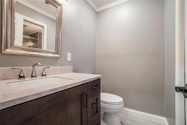 708 Mcgill Pl NE, Atlanta, GA 30312 - bathroom with vanity, toilet, crown molding, and baseboards