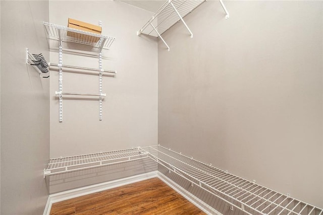 708 Mcgill Pl NE, Atlanta, GA 30312 - walk in closet featuring wood finished floors