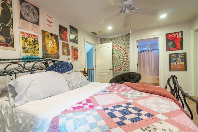 bedroom featuring ensuite bathroom and ceiling fan