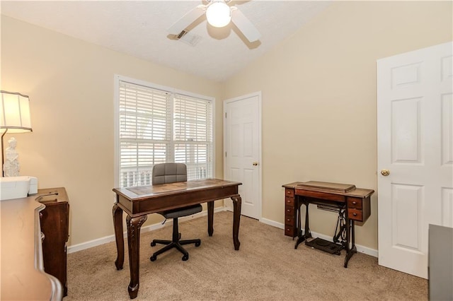 carpeted office space with lofted ceiling and ceiling fan