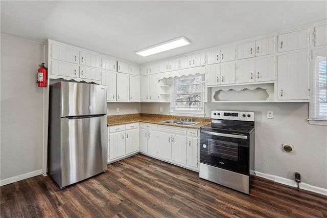 kitchen featuring baseboards, open shelves, white cabinets, dark wood finished floors, and appliances with stainless steel finishes
