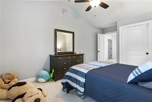 bedroom with carpet, lofted ceiling, and ceiling fan