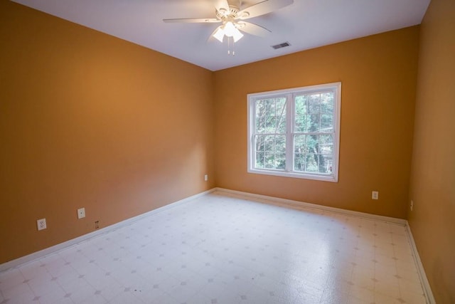 unfurnished room featuring ceiling fan