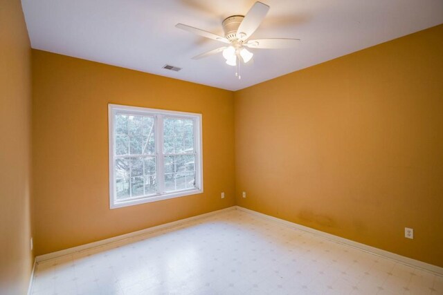 spare room featuring ceiling fan