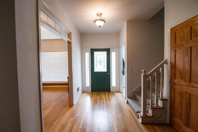 entrance foyer featuring light hardwood / wood-style floors