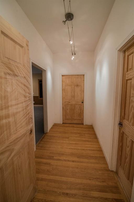 hall featuring light hardwood / wood-style flooring