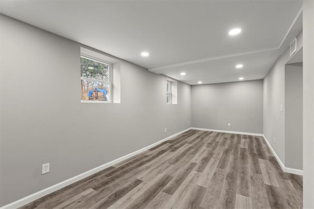 basement featuring light hardwood / wood-style flooring