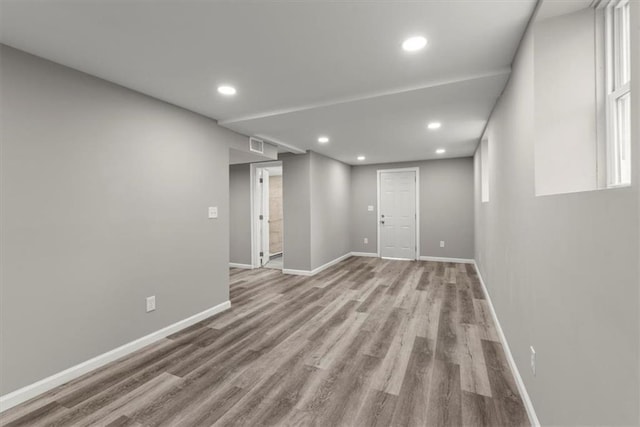 spare room featuring light hardwood / wood-style floors