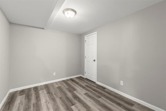 empty room featuring hardwood / wood-style floors