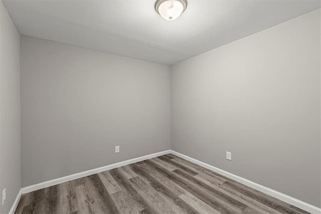 unfurnished room featuring wood-type flooring