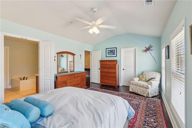 bedroom with dark wood-type flooring, ceiling fan, and lofted ceiling