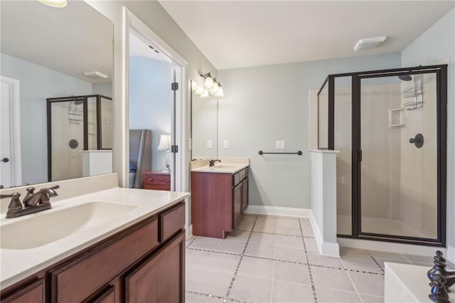 bathroom featuring vanity and a shower with shower door