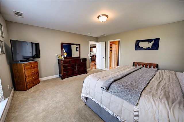 bedroom featuring carpet, visible vents, and baseboards