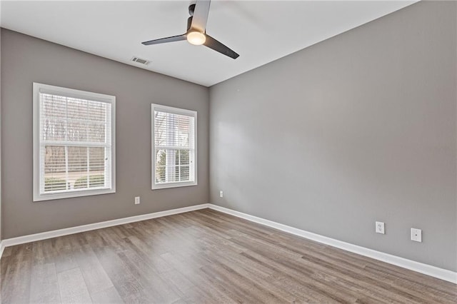 unfurnished room featuring wood-type flooring and ceiling fan