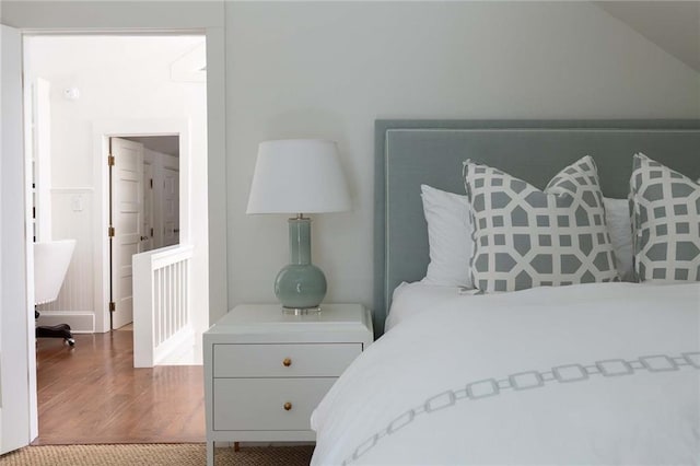 bedroom with hardwood / wood-style flooring