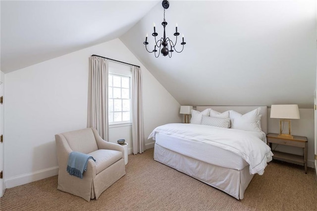 carpeted bedroom with a chandelier and vaulted ceiling