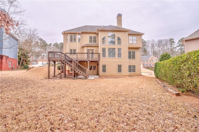 rear view of house with a deck