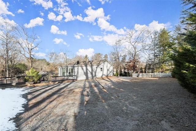 exterior space featuring a wooden deck