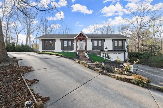 view of front of property featuring a garage