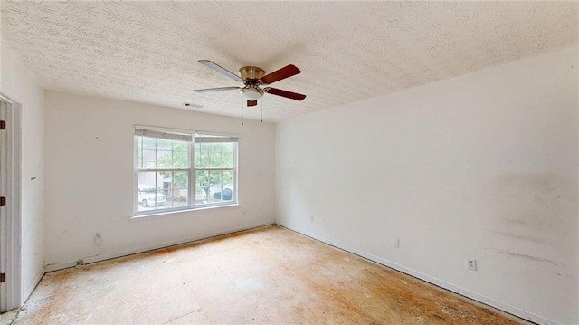 176 Silver Fox Trl, Dallas, GA 30157 - spare room with a ceiling fan and a textured ceiling