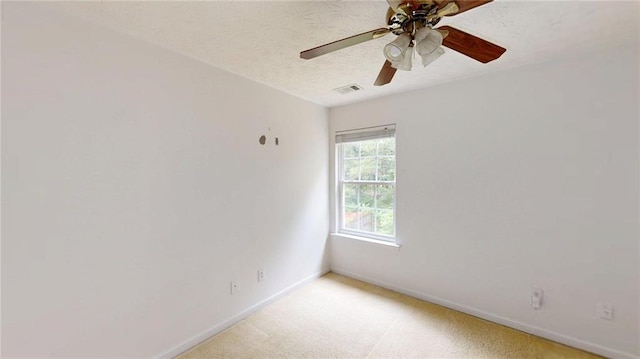176 Silver Fox Trl, Dallas, GA 30157 - empty room featuring baseboards, a ceiling fan, a textured ceiling, and light colored carpet
