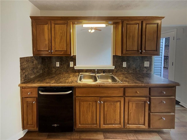 kitchen with sink, backsplash, dishwasher, and ceiling fan