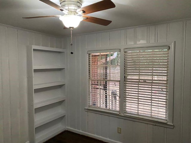 unfurnished room featuring ceiling fan