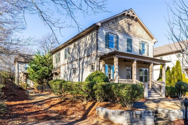 view of front of house with ceiling fan and covered porch