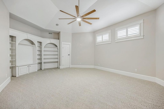 47 Fern Leaf Way, Newnan, GA 30265 - spare room with ceiling fan, baseboards, light colored carpet, and vaulted ceiling