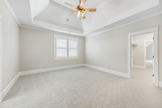 47 Fern Leaf Way, Newnan, GA 30265 - unfurnished room with a tray ceiling, a ceiling fan, crown molding, carpet, and baseboards