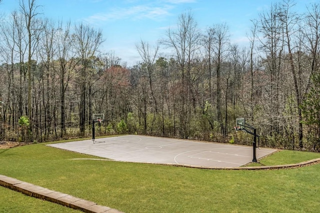 47 Fern Leaf Way, Newnan, GA 30265 - view of sport court with community basketball court, a lawn, and a view of trees
