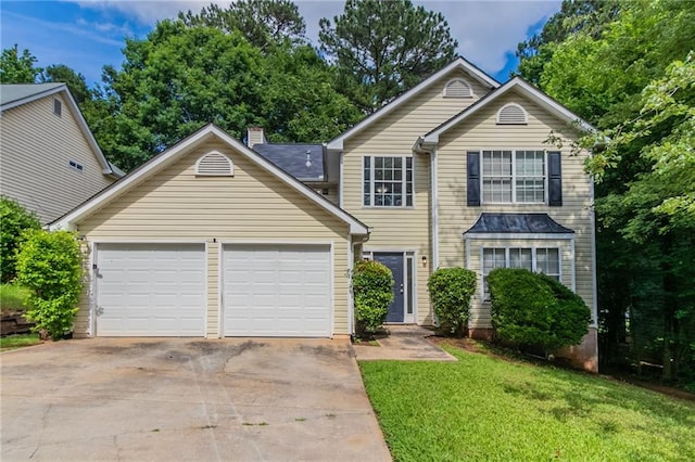 3732 Landgraf Cv, Decatur, GA 30034 - traditional-style home with a garage, driveway, a front lawn, and a chimney