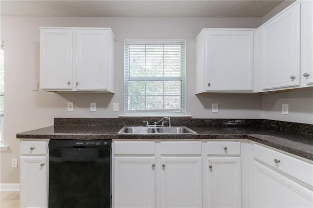 3732 Landgraf Cv, Decatur, GA 30034 - kitchen with dishwasher, a sink, dark countertops, and white cabinetry