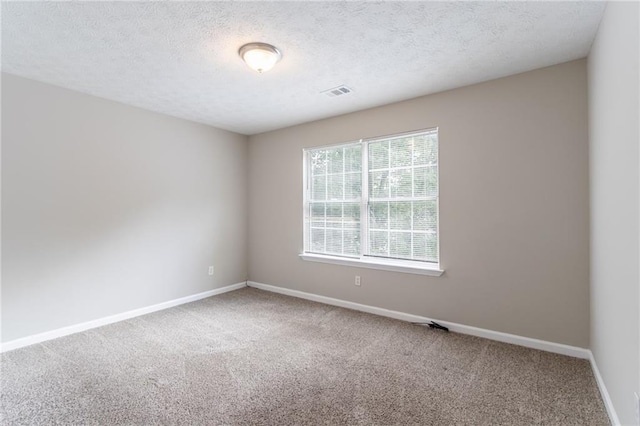 3732 Landgraf Cv, Decatur, GA 30034 - empty room with carpet floors, baseboards, and a textured ceiling