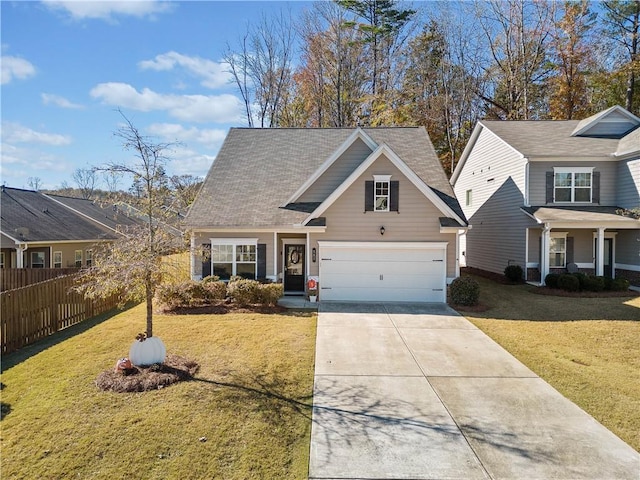 view of front of house with a garage and a front yard