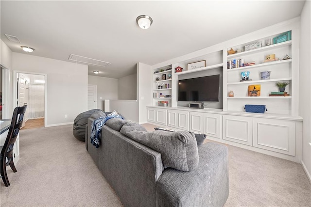 living room featuring light carpet