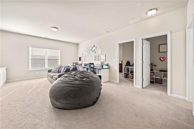 living room with light colored carpet